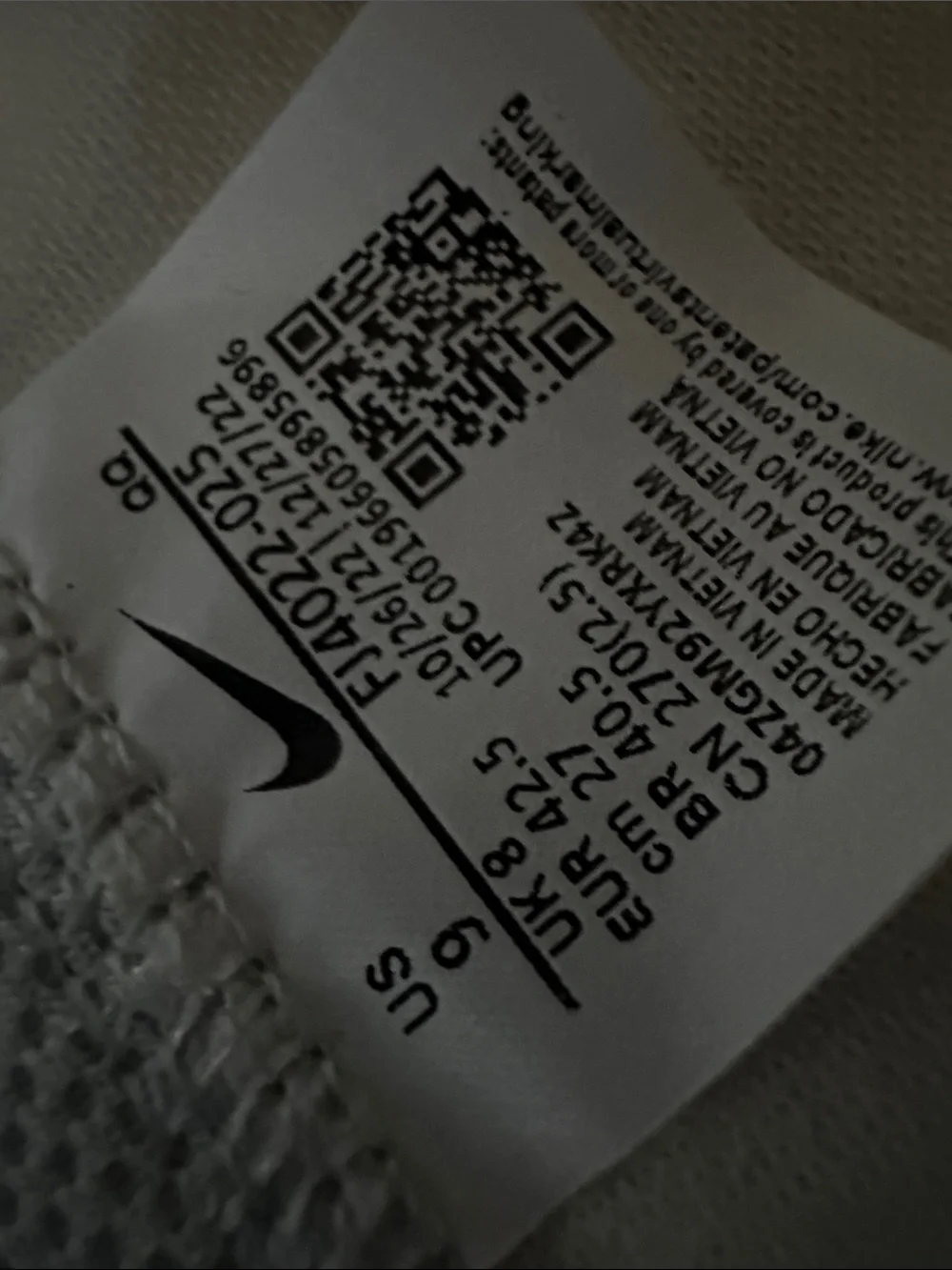 Nike High-Top Sneakers in White with Black Swoosh
